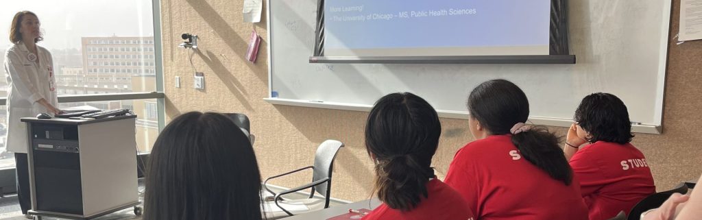 Dr. Churpek gives a presentation to students from the HOPE program explaining how she became a physician scientist.