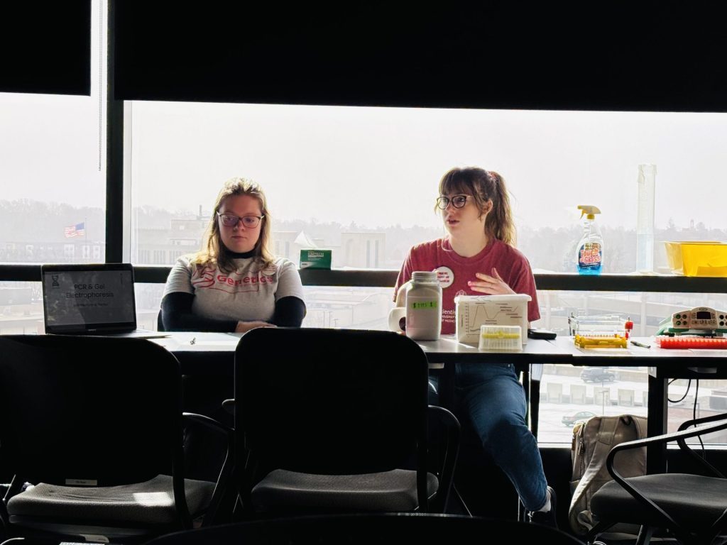 Churpek lab members show off their skills while teaching high school students associated with the HOPE program.